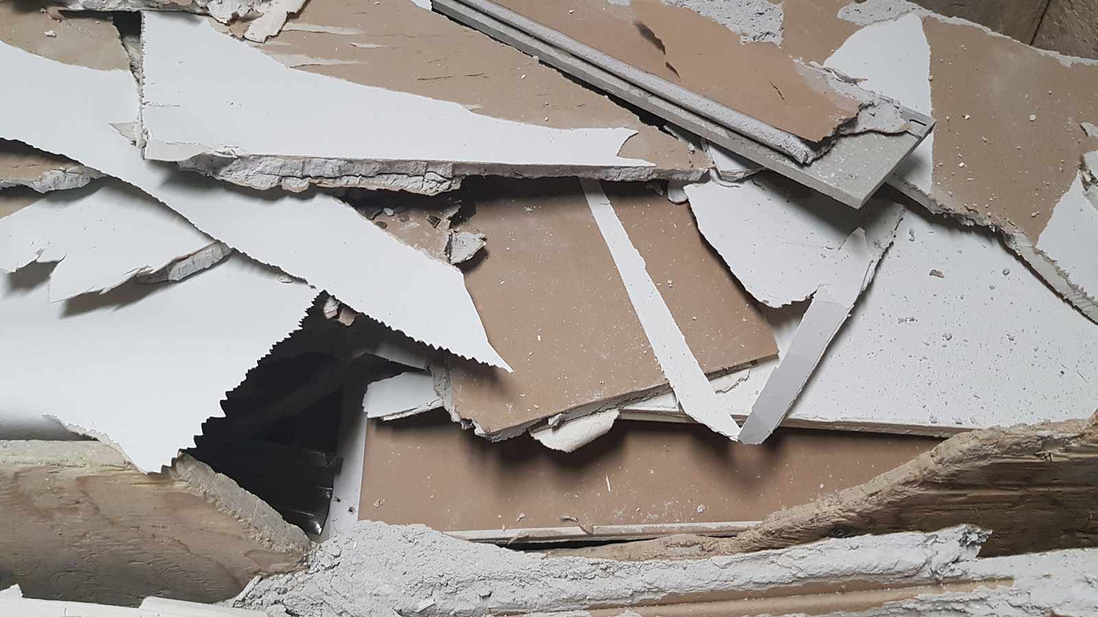 Drywall scraps stacked and ready for disposal after a Chicago remodel.